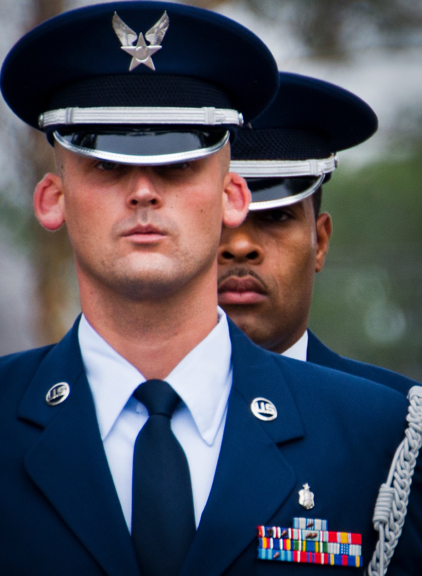 Staff Sgt.s James Rodenberg and William Anderson, of the Eglin Honor Guard, stand at attention during the Senior Airman Josh Santos memorial Jan. 13 at Duke Field.  Santos passed away Nov. 26 from colon cancer.  He was a radio operator with the 711th Special Operations Squadron.  During the memorial, it was announced the Duke Field gym would be renamed Santos Strength in his honor.  (U.S. Air Force photo/Tech. Sgt. Samuel King Jr.)