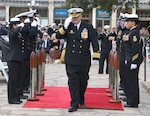 Navy Capt. John D. Larnerd is piped ashore Jan. 11as he retires after more than 35 years of service.
Photo by Lori A. Newman