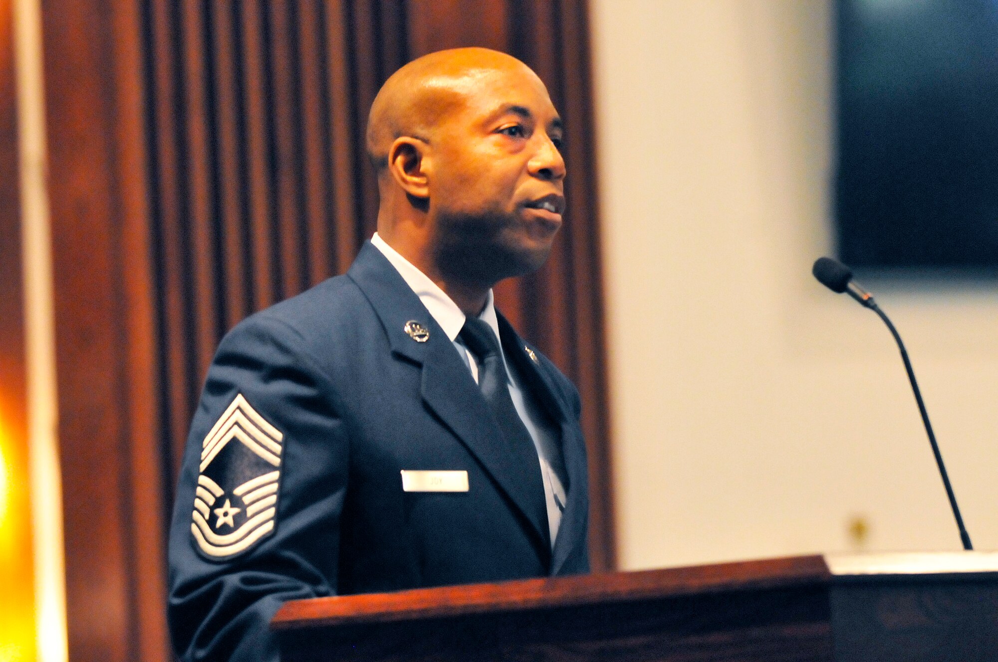 Chief Master Sgt. Gregory C. Joy, 461st MXG/CEM speaks about the influence of Dr. Martin Luther King, Jr.  in his life during a commemorative service, "Celebrating Diversity in the Legacy of Dr. King", Jan. 17 at Robins Chapel. (U. S. Air Force photo/Sue Sapp)