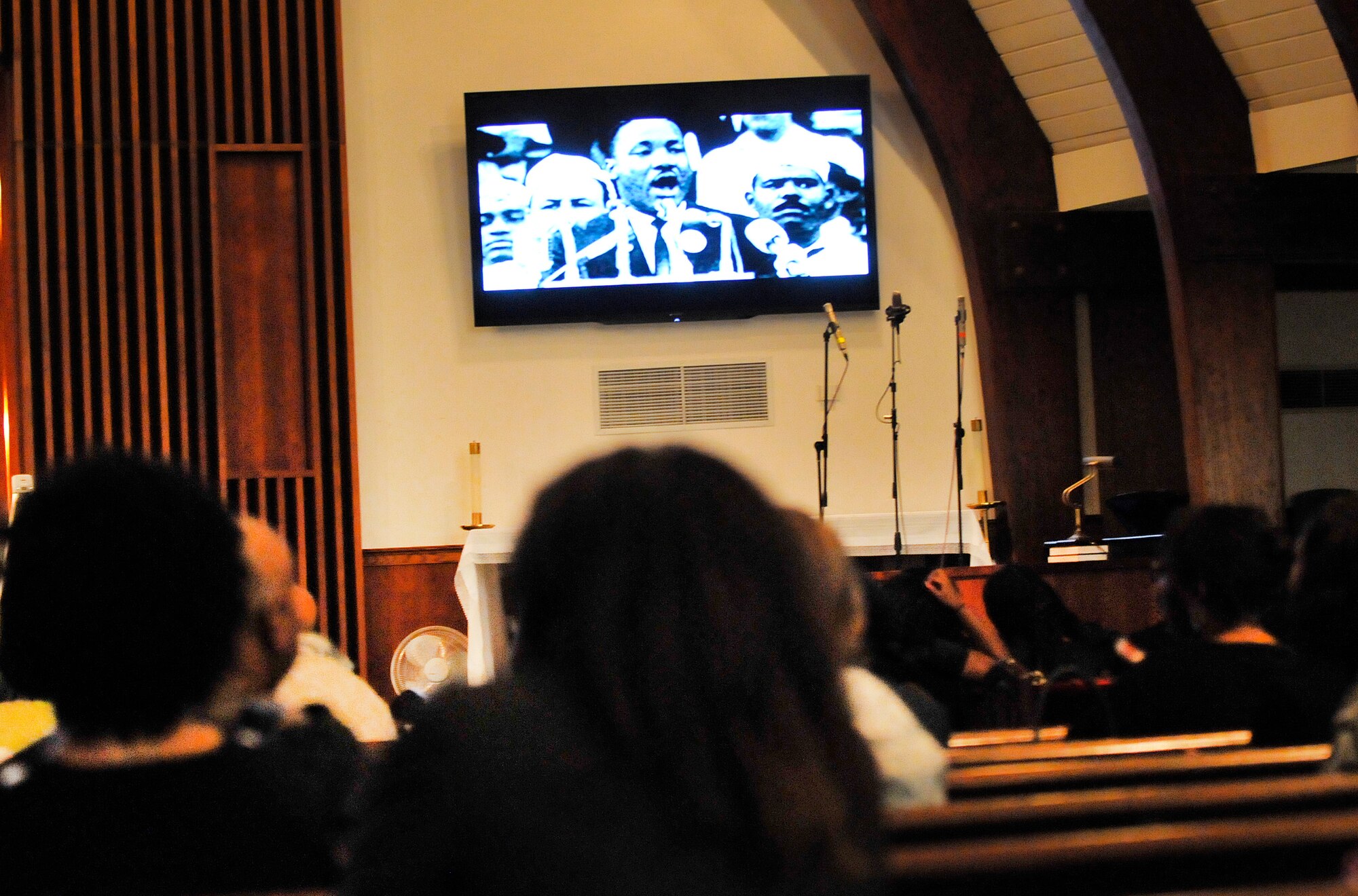 The Dr. Martin Luther King, Jr. commemorative service, "Celebrating Diversity in the Legacy of Dr. King", was Jan. 17 at Robins Chapel. Attendees watch Dr. King's "I Have A Dream" speech. (U. S. Air Force photo/Sue Sapp)