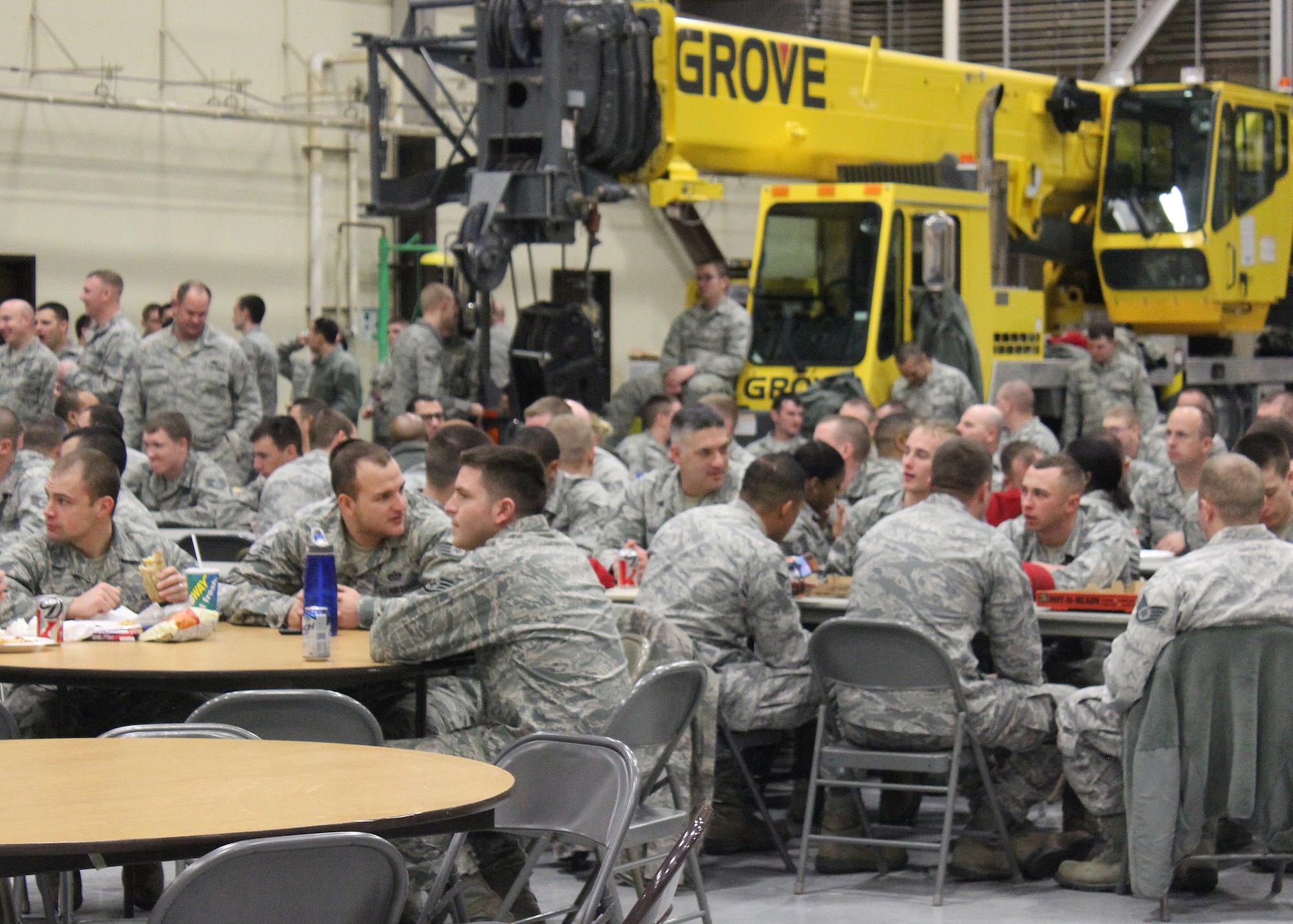 Members of Malmstrom’s 819th RED HORSE Squadron eat lunch and talk amongst each other at a ceremony held in honor of the squadron’s 47th birthday Jan. 11.  (Courtesy photo)