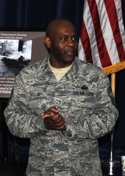 Chief Master Sgt. Bernard Taylor, 100th Communications Squadron superintendent, speaks at the annual Martin Luther King Jr. Remembrance Breakfast Jan. 18, 2013, at the Bob Hope Community Center at RAF Mildenhall, England. The San Antonio, Texas, native helped celebrate King’s efforts during the U.S. civil rights movement. (U.S. Air Force photo by Gina Randall/Released)
