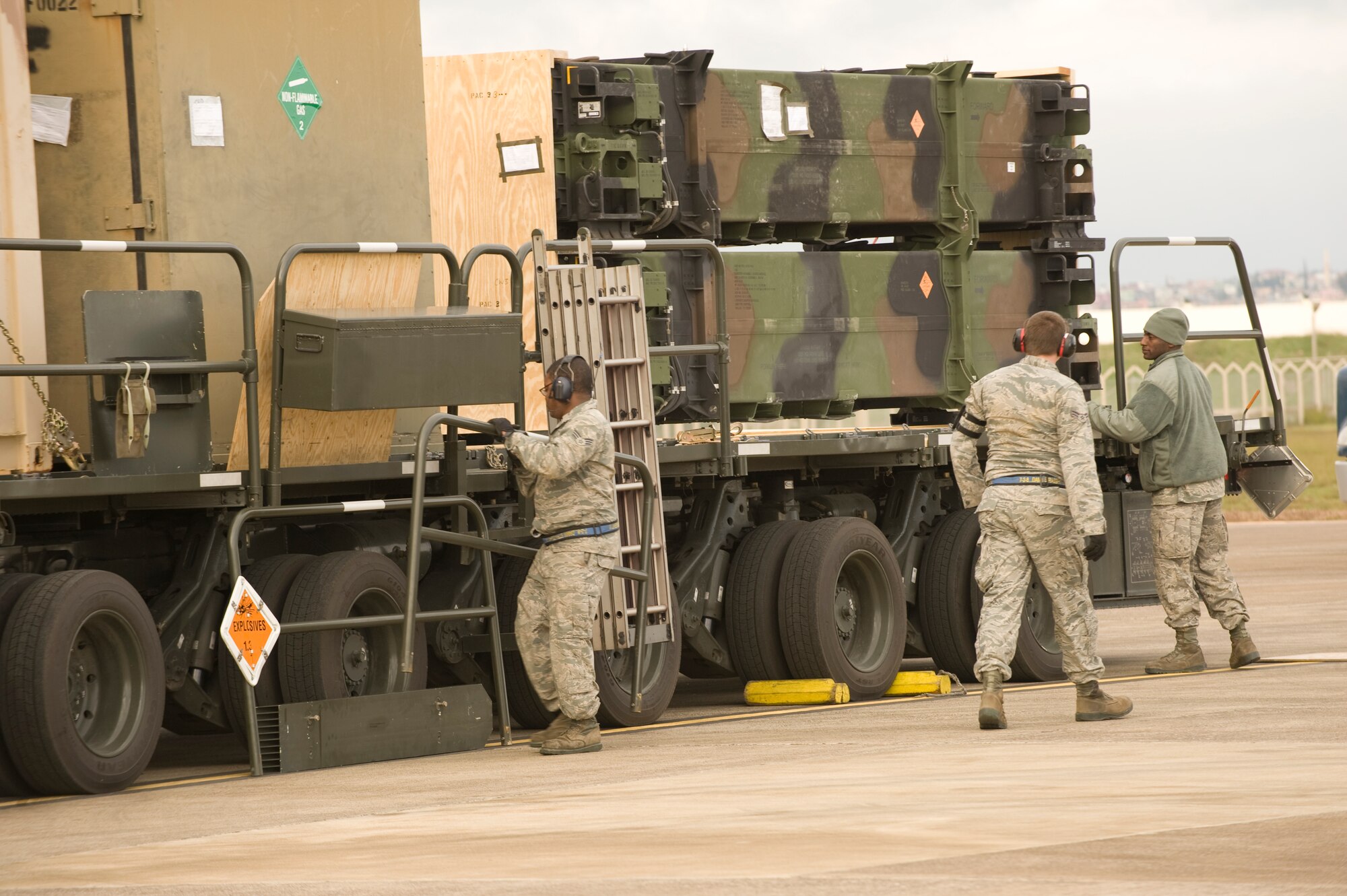 U.S. Air Force Airmen from the 728th Air Mobility Squadron secure Patriot missiles onto a truck bed for transport Jan 6, 2013, at Incirlik Air Base, Turkey. Two Patriot batteries from the United States are deploying to Turkey to support NATO's commitment to Turkey's security. The missiles will augment Turkey's air defense capabilities. (U.S. Air Force photo by Staff Sgt. Marissa Tucker/Released)