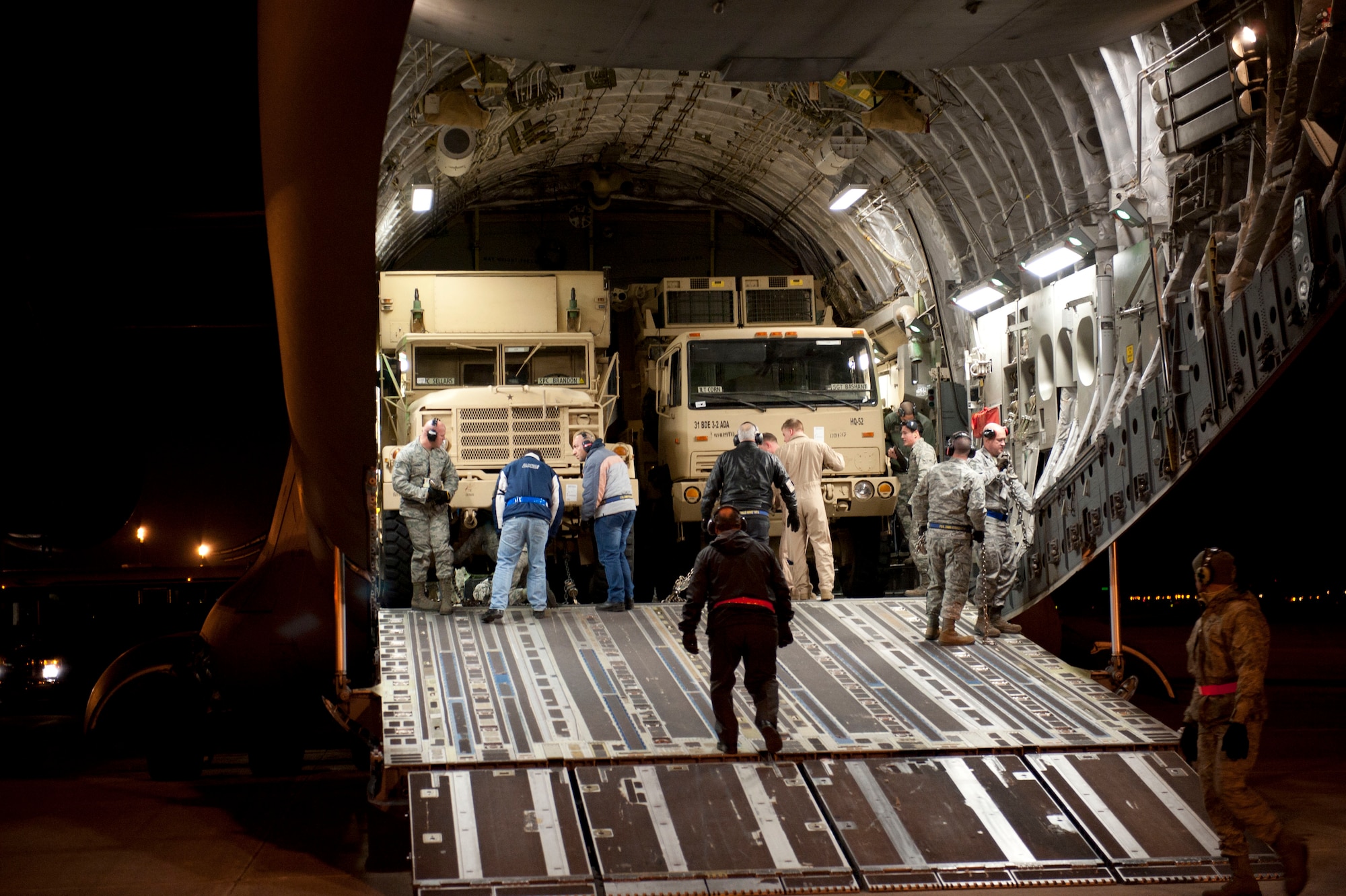 U.S. Air Force Airmen from the 728th Air Mobility Squadron prepare to offload a pair of Patriot missile battery fire control centers Jan. 5, 2012, at Incirlik Air Base, Turkey. Two Patriot missile batteries from the United States are deploying to Turkey to support NATO's commitment to Turkey's security. The batteries will augment Turkey's air defense capabilities. (U.S. Air Force photo by Senior Airman Clayton Lenhardt/Released)