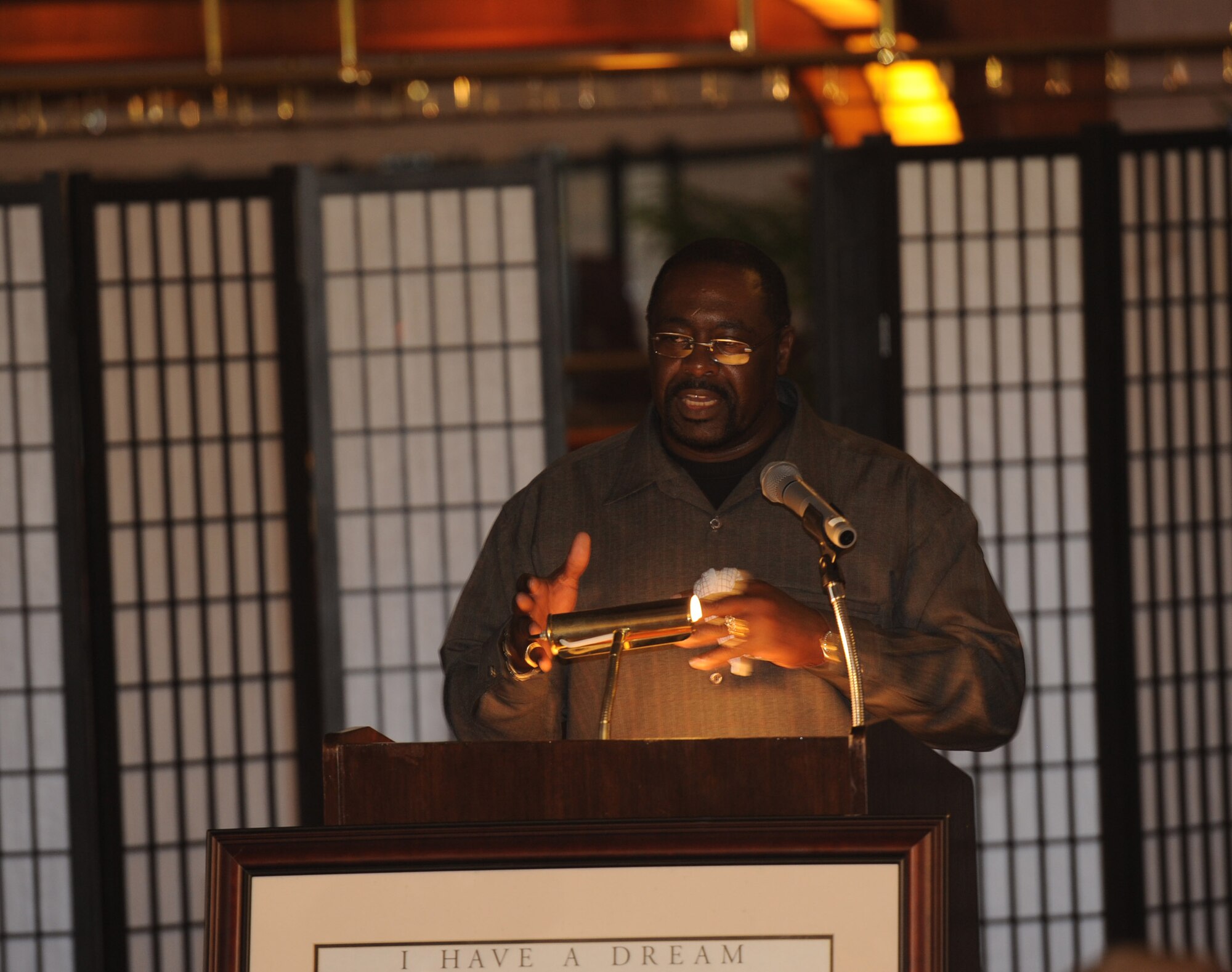 Pastor Leonard Bohanon, a retired U.S. Air Force member, speaks to service members and their families during the Martin Luther King luncheon on Kadena Air Base, Japan, Jan. 18, 2013. The luncheon was the closing event for the base in remembrance of Martin Luther King Jr. (U.S. Air Force photo/Airman 1st Class Malia Jenkins)  
