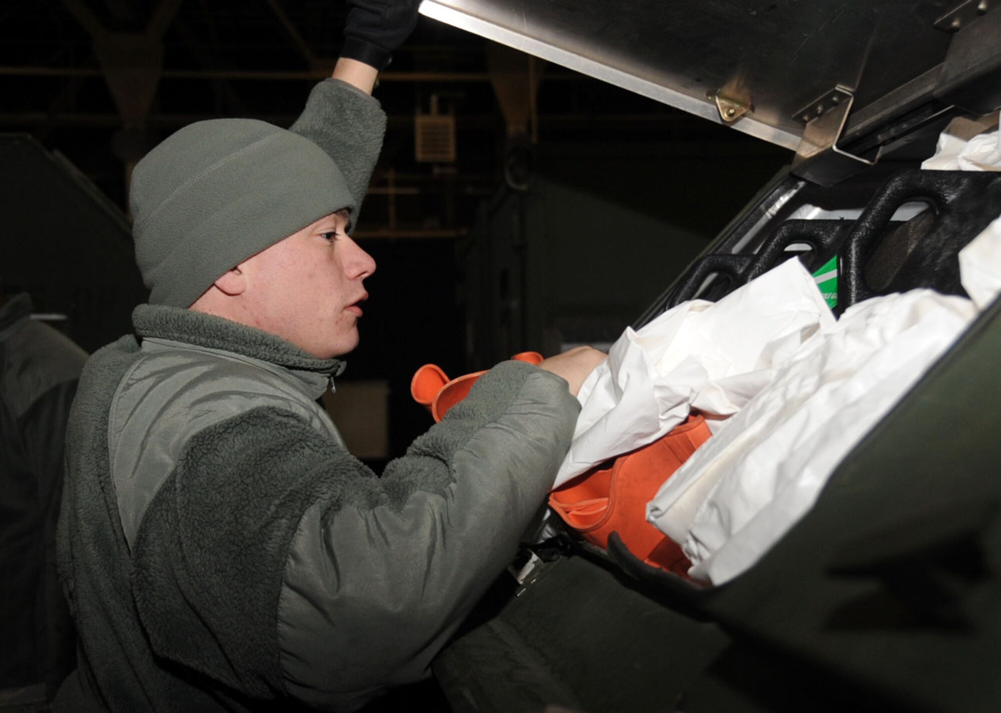 U.S. Air Force Senior Airman Alan Victor, 35th Aircraft Maintenance Squadron fuels systems maintainer, makes sure everything is accounted for before inspection in Hangar 949 at Misawa Air Base, Japan, Jan. 14, 2013. The Aviation Training Relocation exercise provides pilots and air crew members the opportunity to train with different weapon systems and test the their capabilities as a team. (U.S. Air Force photo by Airman 1st Class Kenna Jackson)