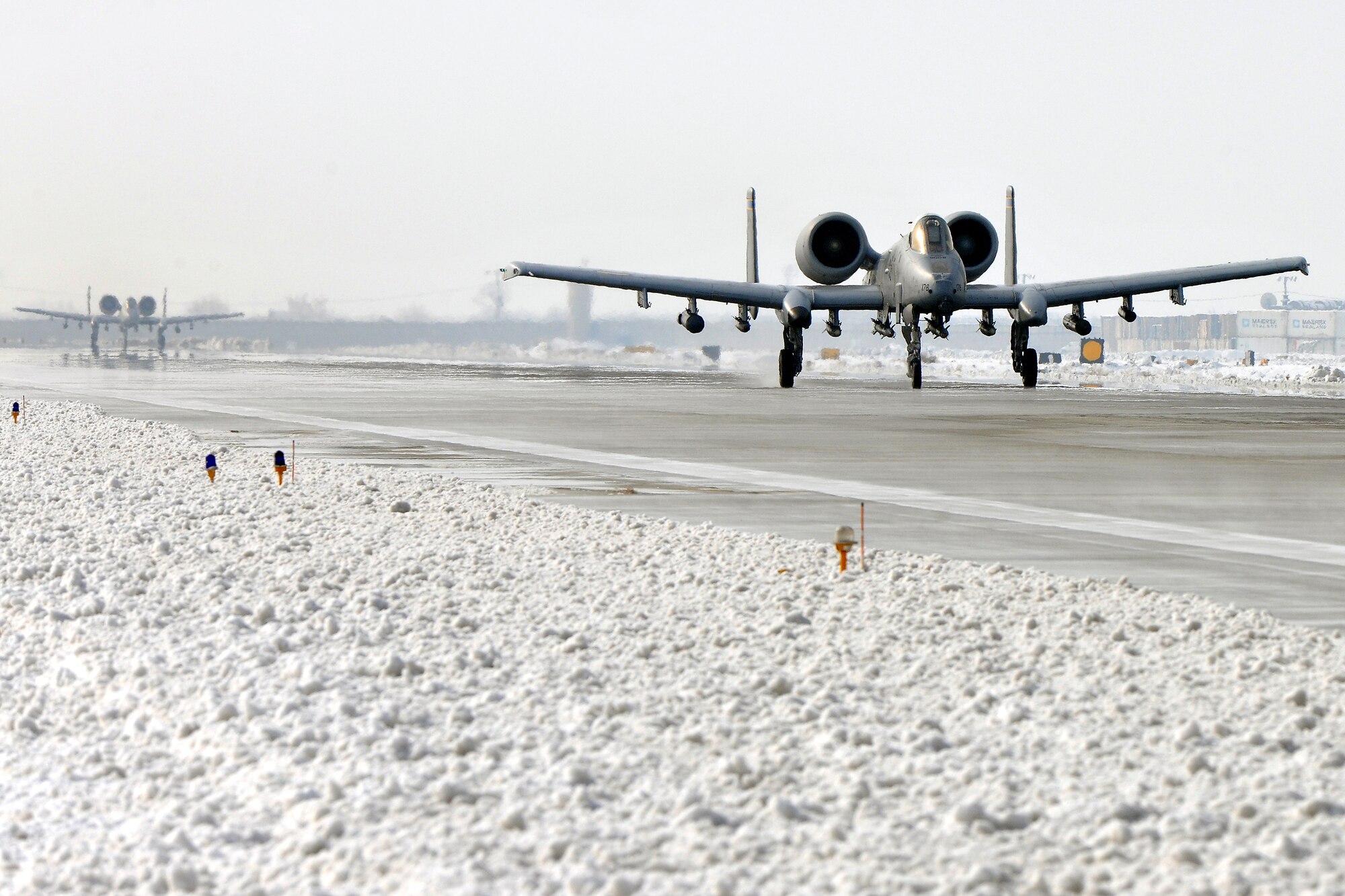 Two U.S. Air Force A-10 Thunderbolt II prepare to depart Bagram Airfield, Afghanistan, Jan. 17, 2013. The A-10 is a specialized ground-attack aircraft which provides close air support to ground forces operating in Afghanistan. (U.S. Air Force photo/Senior Airman Chris Willis)