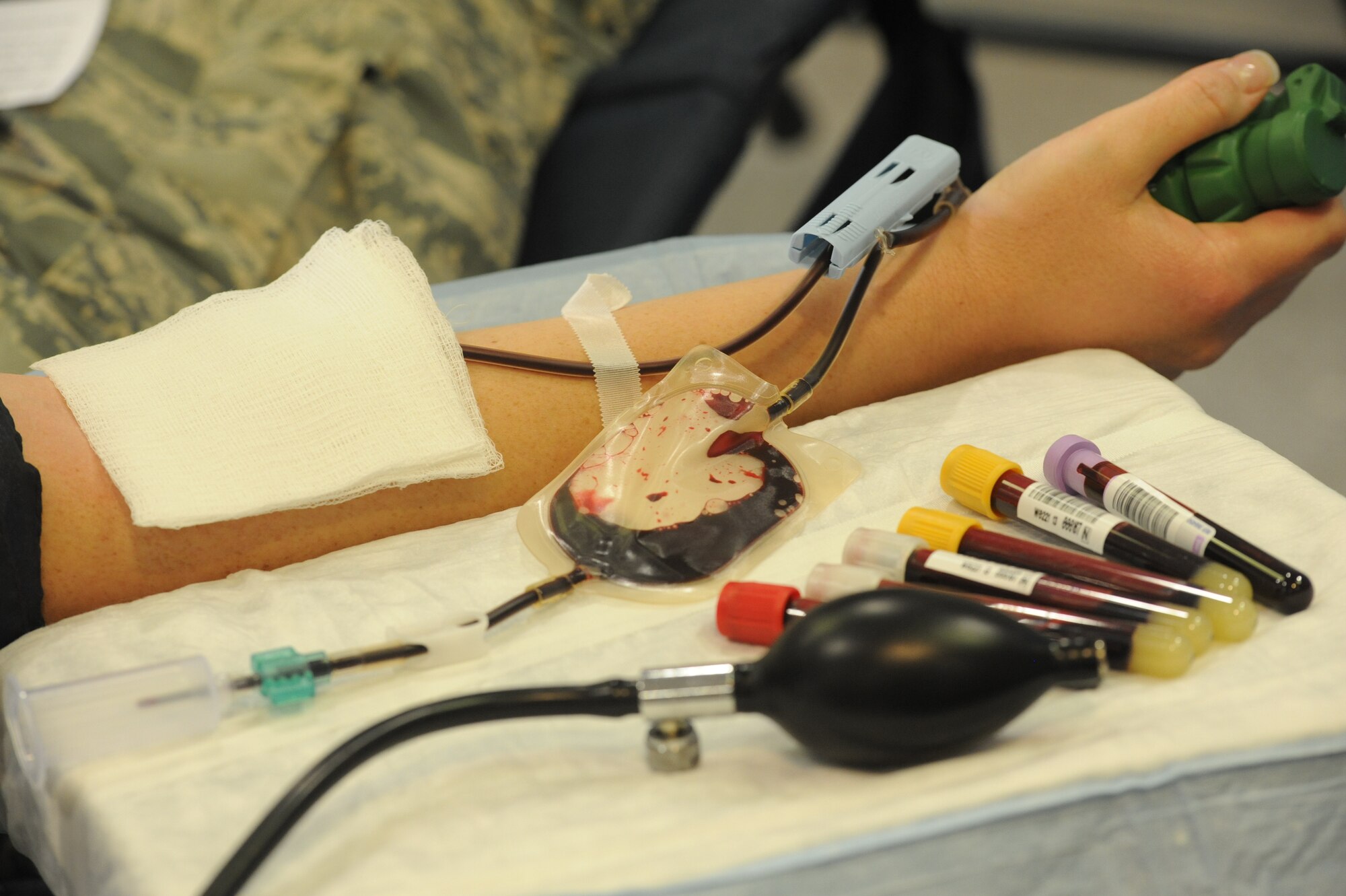 Blood is drawn at the Schilling Community Center for the Martin Luther King Blood Drive on Kadena Air Base, Japan, Jan. 17, 2013. The blood drive was held to remember Martin Luther King Jr. and inform people about his impact on American history. The drive was also one of three events dedicated to remembering MLK. (U.S. Air Force photo/Airman 1st Class Malia Jenkins)