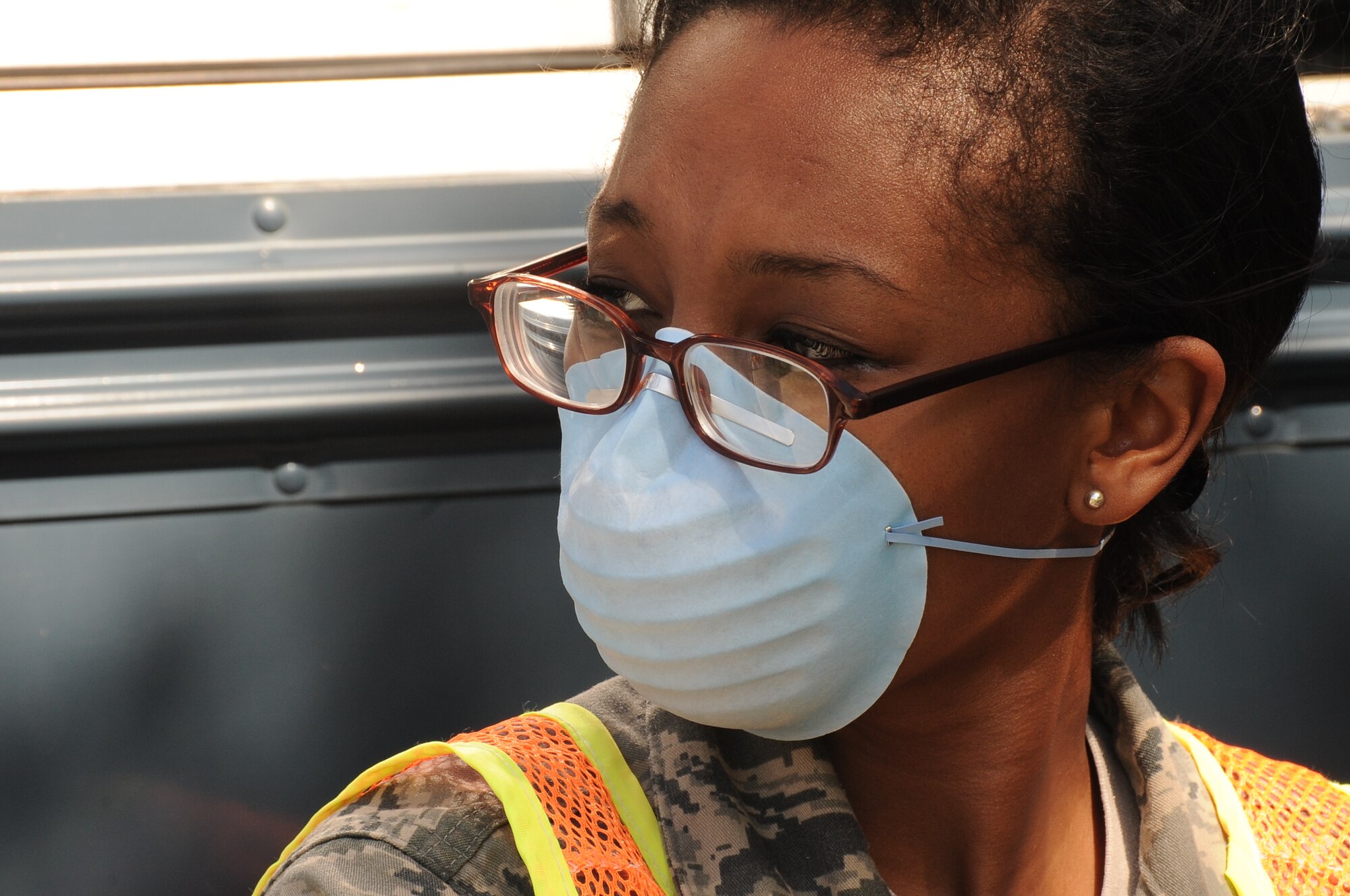 A medical liaison from the 36th Medical Group stands by to provide assistance to simulated evacuees arriving as part of a noncombatant evacuation order scenario at Andersen Air Force Base, Guam, Jan. 14, 2013. The scenario was part of Andersen’s operational readiness exercise held 13-16 January. (U.S. Air Force photo by Airman 1st Class Adarius Petty/Released)