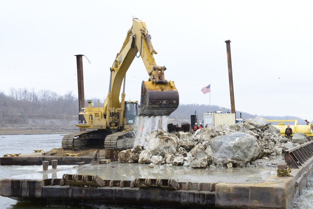 The removal of 890 cubic yards of limestone from the navigation channel on the Mississippi River near Thebes, Ill., began Dec. 17, 2012.  This is just one phase of the action the Corps is taking to improve the navigation channel for the river industry.