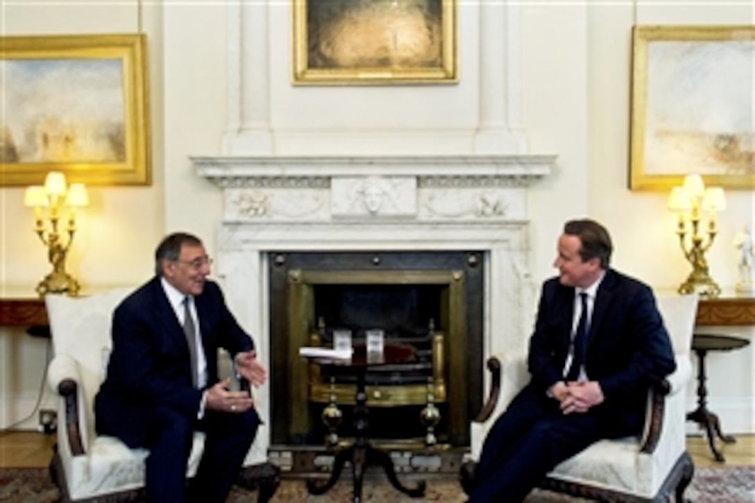 U.S. Defense Secretary Leon E. Panetta, left, meets with British Prime Minister David Cameron at 10 Downing Street in London, Jan. 18, 2013. Panetta is on a six-day trip to Europe to visit with defense counterparts and troops. 