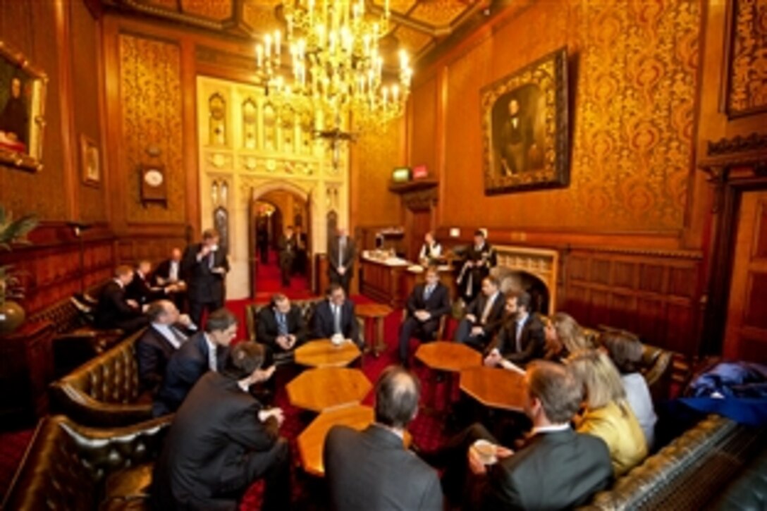 U.S. Defense Secretary Leon E. Panetta, center, meets with members of Parliament in London, Jan. 18, 2013. Panetta is on a six-day trip to Europe to visit with defense counterparts and troops.