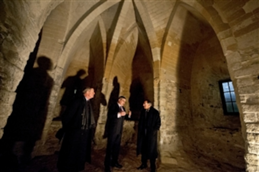 U.S. Defense Secretary Leon E. Panetta visits Sir Thomas More's cell in the Tower of London with Dick Harrold, governor of the Tower of London, in London, Jan. 18, 2013. Panetta is on a six-day trip to Europe to visit with defense counterparts and troops.