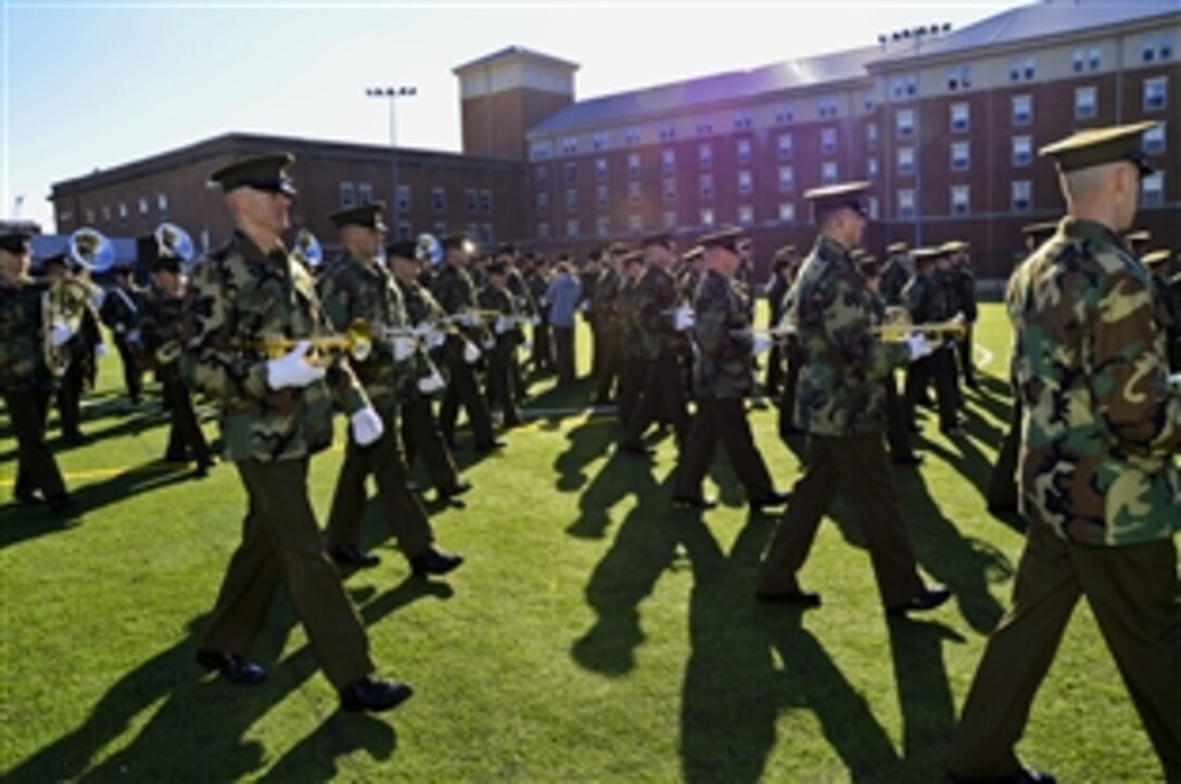 Members of the U.S. Marine Corps Band, known as "The President's Own," practice military movement and turning drills during a rehearsal at the Marine Barracks in Washington, D.C., Jan. 18, 2013. The band was activated on July 11, 1798, by act of Congress, and will participate in the 57th presidential Inauguration, scheduled for Jan. 21.