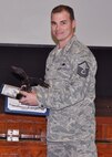 Master Sgt. Paul Greene, 919th Aircraft Maintenance Squadron, displays his 2012 Dedicated Crew Chief of the Year award. (U.S. Air Force photo/Dan Neely)