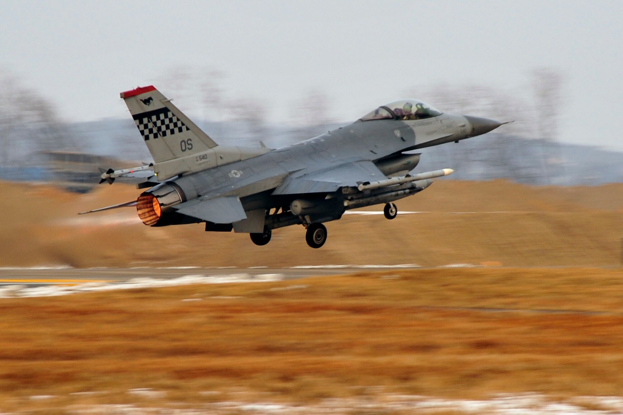 An F-16 Fighting Falcon takes off for an exercise sortie during operational readiness exercise Beverly Midnight 13-01 at Osan Air Base, Republic of Korea, Jan. 16, 2013. The exercise tests Osan’s ability to defend the base and conduct daily operations during a heightened state of readiness. (U.S. Air Force photo/Airman 1st Class Alexis Siekert)