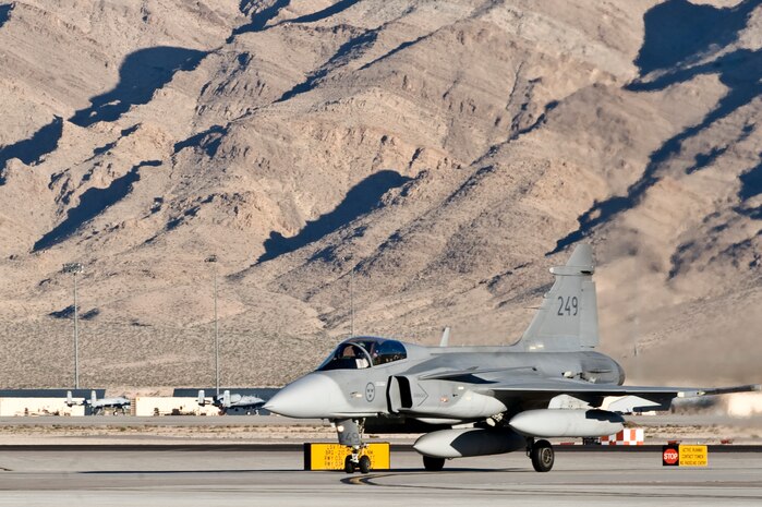 NELLIS AIR FORCE BASE, Nev. – A Swedish JAS-39 Gripen fighter jet taxis after landing at Nellis Air Force Base, Nev., to participate in RED FLAG 13-2 Jan. 17, 2013. The Red Flag exercises are conducted in four to six cycles a year by the 414th Combat Training Squadron of the 57th Wing. (U.S. Air Force photo by Senior Airman Matthew Lancaster)

