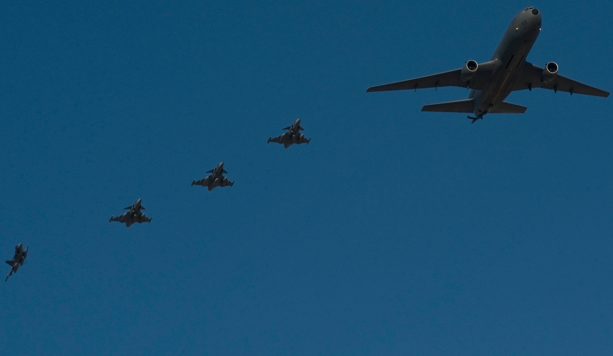 NELLIS AIR FORCE BASE, Nev. – A four-ship formation of Swedish JAS-39 Gripen fighter jets follow a refueling aircraft as they arrive from Maine to participate in RED FLAG 13-2 Jan. 17, 2013, at Nellis Air Force Base, Nev. RED FLAG 13-2 will have more than 90 aircraft that are scheduled to depart from Nellis twice a day until Feb. 1 and will take part in mission exercises that can last as long as eight hours. (U.S. Air Force photo by Senior Airman Daniel Hughes)


