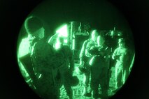Cpl. Joseph. B. Altamirano (left), a North Carolina native and motor transportation operator with 2nd Supply Battalion, 2nd Marine Logistics Group, briefs his team before they set out on a night convoy at Camp Lejeune’s Home Station Training Lanes in Holly Ridge, N.C., Jan. 16, 2013. The Marines relied on night vision devices for a portion of their mission and used the convoy to hone their night-time navigation and communication skills in conjunction with the unit’s command operations center.