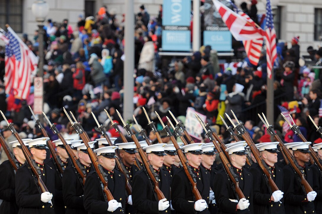 The U.S. Marine Corps Ceremonial Guard Company, part of the president's escort, marches in the inauguration parade for the 57th Presidential Inauguration, Jan. 21. More than 2,100 servicemembers from each of the five branches are marching in the parade, with approximately 5,000 supporting inaugural festivities.