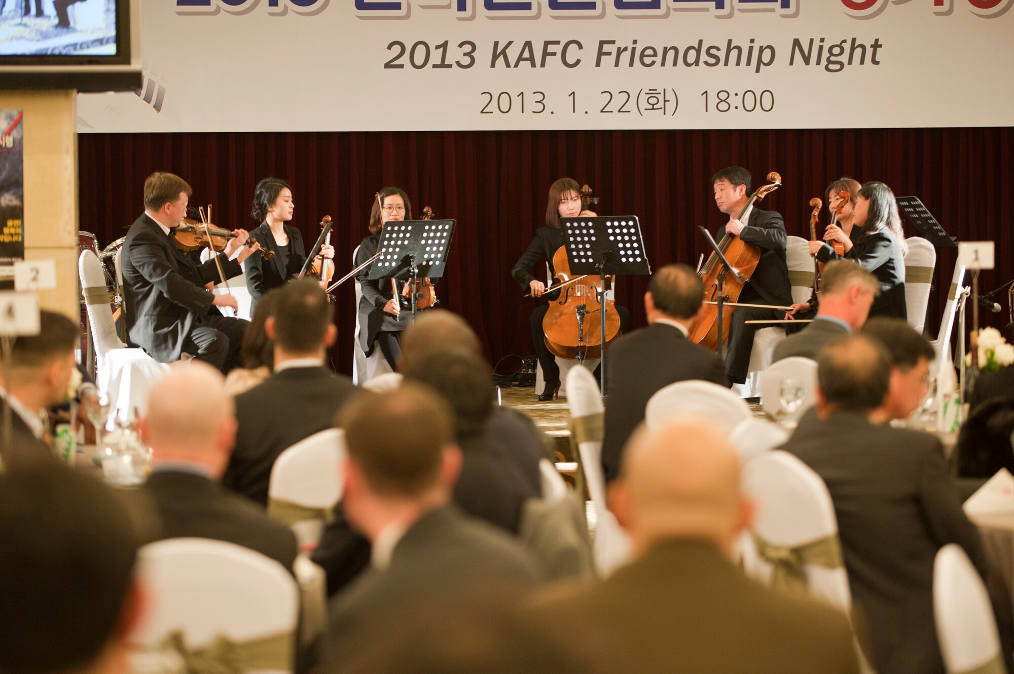 Members of the Gunsan Philharmonic Orchestra perform for members of the 8th Fighter Wing and the Korean American Friendship Council at Gunsan City, South Korea, Jan. 22, 2013. The performance was part of the KAFC Friendship Night, which featured a performance of samulnori and a dinner in honor of all the work the 8th FW and KAFC do for the local Gunsan City community. (U.S. Air Force photo by Staff Sgt. Jonathan Fowler/Released)