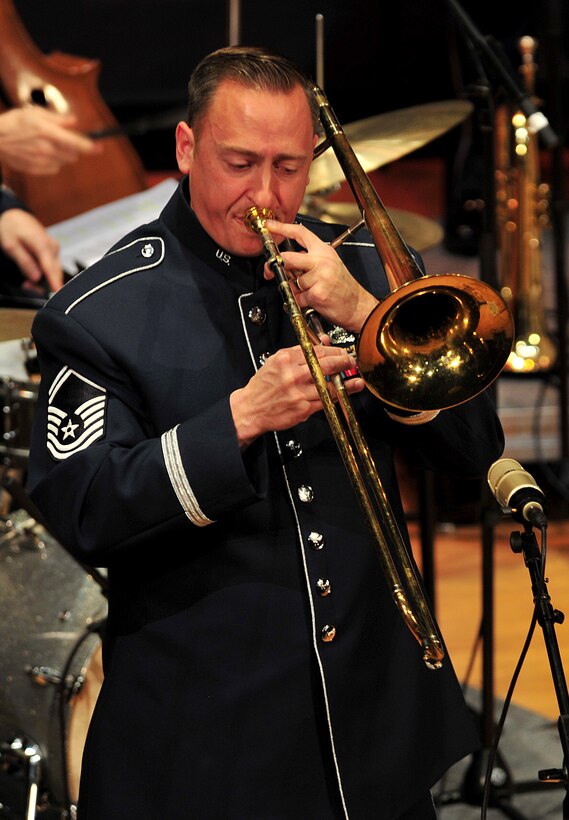Senior Master Sgt. Richard Thorp plays a trombone solo during a performance by “The Commanders Jazz Ensemble” in the Martin Woldson Theater at the Fox Theater in Spokane, Wash., Jan. 20, 2013. The band, from Travis Air Force Base, Calif., performed community outreach in Spokane, Pullman and Cheney, Wash., and Coeur D'Alene, Idaho, to spread the word about the Air Force mission. (U.S. Air Force photo by Senior Airman Taylor Curry)
