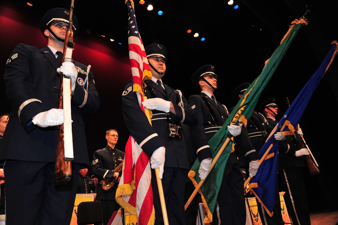 Honor guard members present the colors before “The Commanders Jazz Ensemble” concert in the Martin Woldson Theater at the Fox Theater in downtown Spokane, Wash., Jan. 20, 2013. Their performance included selections from Glenn Miller, Count Basie and Stan Kenton, as well as the sounds from modern jazz groups. The band is from Travis Air Force Base, Calif. (U.S. Air Force photo by Senior Airman Taylor Curry)