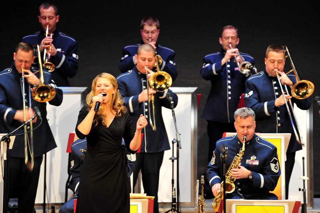 Senior Airman Meg Hokaj performs the song “L-O-V-E,” by Nat King Cole, in the Martin Woldson Theater at the Fox Theater in downtown Spokane, Wash., Jan. 20, 2013. The 18-member musical group is from Travis Air Force Base, Calif., and performs variations of big band jazz including traditional, cool, bop, swing, as well as Broadway, and patriotic favorites. (U.S. Air Force photo by Senior Airman Taylor Curry)