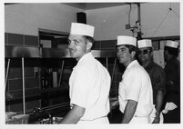 North Carolina Air National Guard, NCANG, 263rd Mobile Combat Communications Squadron, 263rd MCCS, 263rd Combat Communications Squadron, 263rd CCS, 263rd Communications Squadron, 263rd Comm Sq, Serving Line at Badin Installation, Left to Right, #1 Waylan Efird, #2 Bill Bryans, #3 Coyte Cook, #4 Lewis Furr  (Photo by NCANG Heritage Program)