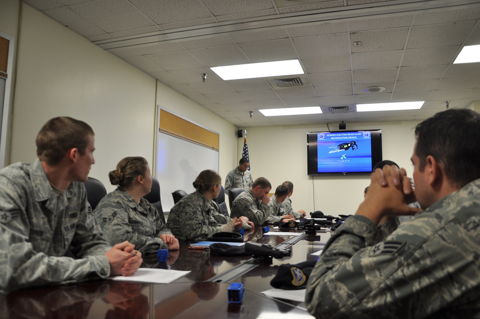 GOODFELLOW AIR FORCE BASE, Texas— 17th Security Forces Squadron members listen to classroom instruction Jan. 15, at the SFS building. The instruction is the first part of an all day annual training, which teaches the proper use of non-lethal weapons. (U.S. Air Force photo/Airman 1st Class Jessica Keith) 
