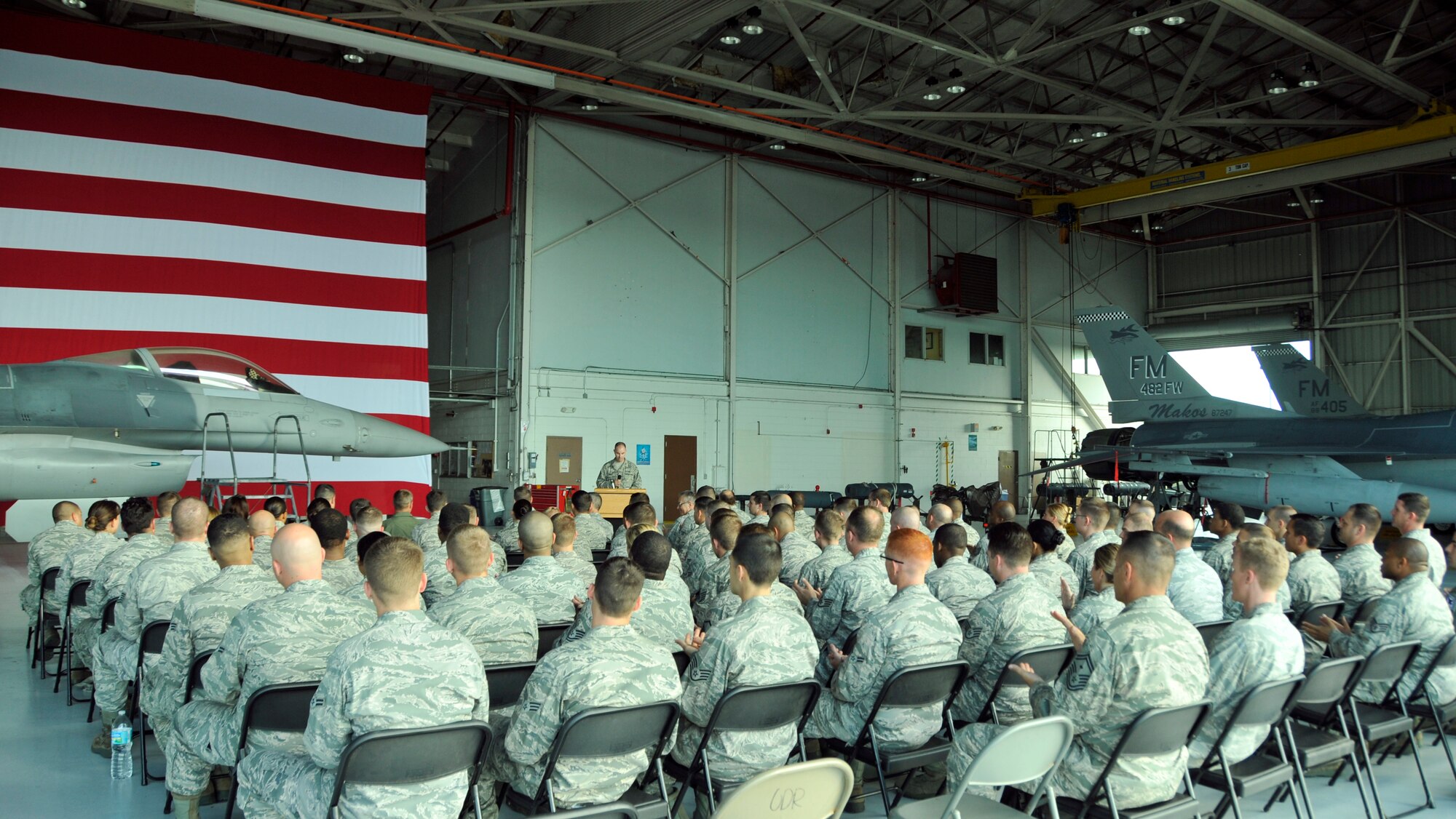 Airmen of Homestead Air Reserve Base and Detachment 2, 20h Operations Group, gathered during a dedicated crew chief ceremony at Homestead Air Reserve Base, Jan. 14. The dedicated crew chief ceremony was especially poignant as it’s the first assignment of an active duty crew chief to an F-16 at Homestead ARB since Hurricane Andrew. Air Combat Command’s command chief master sergeant, Chief Master Sgt. Richard A. Parsons, visited Homestead ARB to get a first-hand look at how the active duty Airmen of Detachment 2, 20th OG, are integrating with the 482nd Fighter Wing. (U.S. Air Force photo/Ross Tweten)