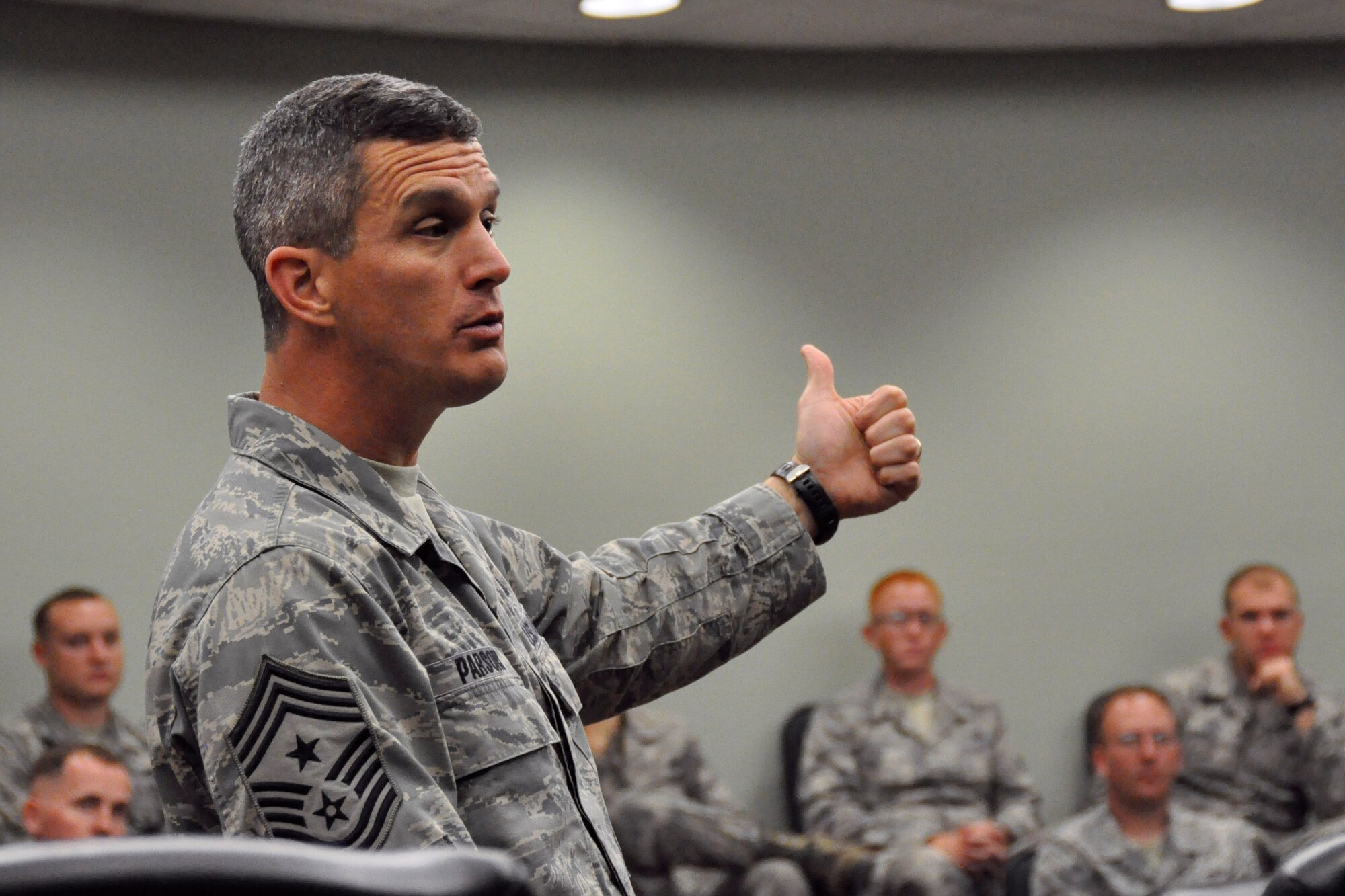 Air Combat Command’s command chief master sergeant, Chief Master Sgt. Richard A. Parsons, discusses Total Force Integration with  active duty Airmen of Detachment 2, 20th Operations Group, during a visit to Homestead Air Reserve Base, Fla., Jan. 14. Parsons visited to get a first-hand look at how the active duty Airmen of Detachment 2, 20th OG, are integrating with the 482nd Fighter Wing. (U.S. Air Force photo/Ross Tweten)