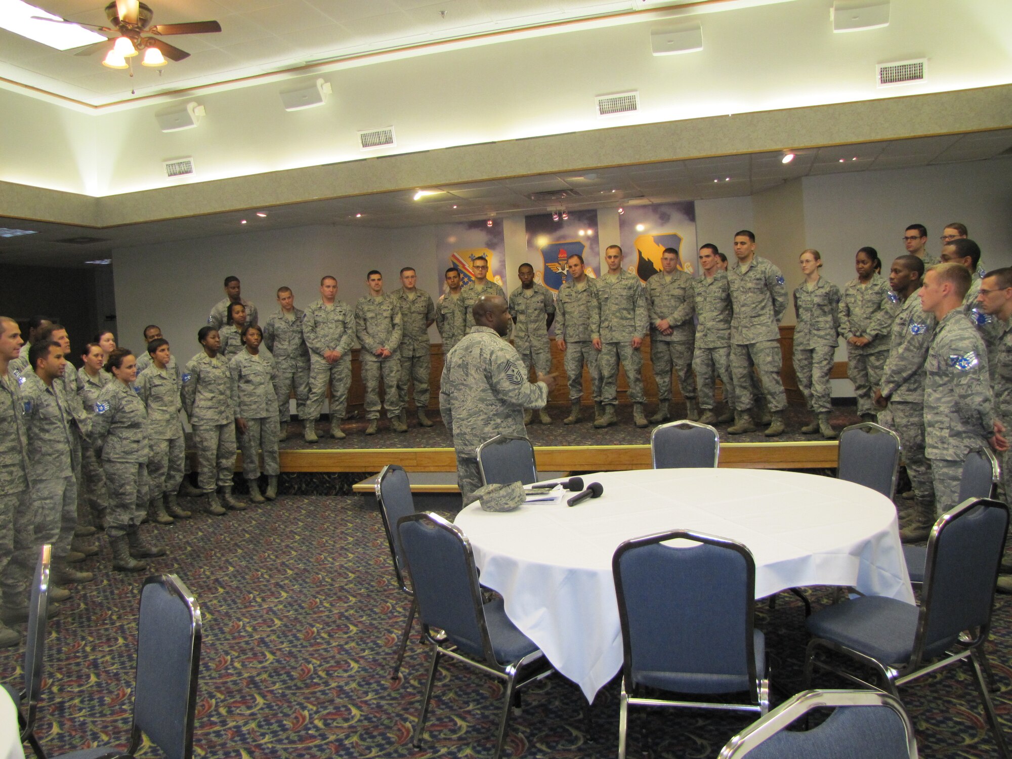 82nd Training Wing Command Chief Master Sgt. Eric Johnson (center) addresses a new crop of Staff Sgt. inductees during a JETS-sponsored NCO induction ceremony at Sheppard Air Force Base, Texas in late 2012.  The JETS organization has moved from mainly a volunteer manpower tool to a career broadening organzation. (U.S. Air Force courtesy photo)