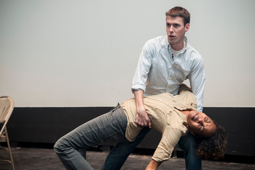 John Mallory and Sharyan Culberson of Catharsis Productions perform a Sex Signals presentation during Wingman Day Jan. 18, 2013, at Moody Air Force Base, Ga. Sex Signals is a sexual assault awareness program that was sponsored by the base’s Sexual Assault Response Coordinator office. (U.S. Air Force photo by Airman Paul Francis/Released)