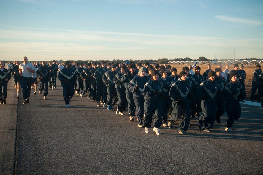 Members of Team Moody participate in a two-mile base run during Wingman Day Jan. 18, 2013, at Moody Air Force Base, Ga. This was the first Wingman Day of the year, and it focused on the social pillar of Comprehensive Airman Fitness. (U.S. Air Force photo by Airman Paul Francis/Released)