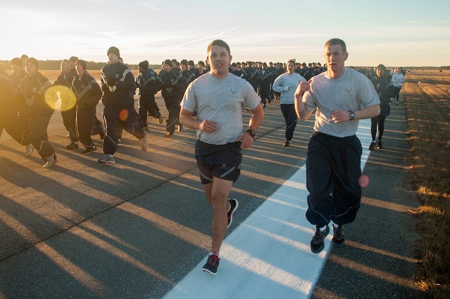 Members of Team Moody participate in a two-mile base run during Wingman Day Jan. 18, 2013, at Moody Air Force Base, Ga. The run was the first event of Wingman Day and was followed by a series of briefings and demonstrations that focused on building strong relationships. (U.S. Air Force photo by Airman Paul Francis/Released) 