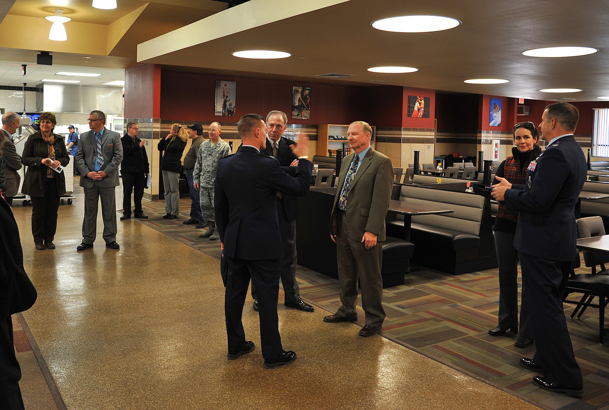 GOODFELLOW AIR FORCE BASE, Texas- Visitors and Team Goodfellow members admire the newly renovated Cressman Dinning Facility Jan. 17 on Goodfellow Air Force Base, Texas. The opening of the dining facility has helped to alleviate the crowding of Western Winds Dining Facility and contributed to less wait time. (U.S Air Force photo/Airman 1st Class Michael Smith)