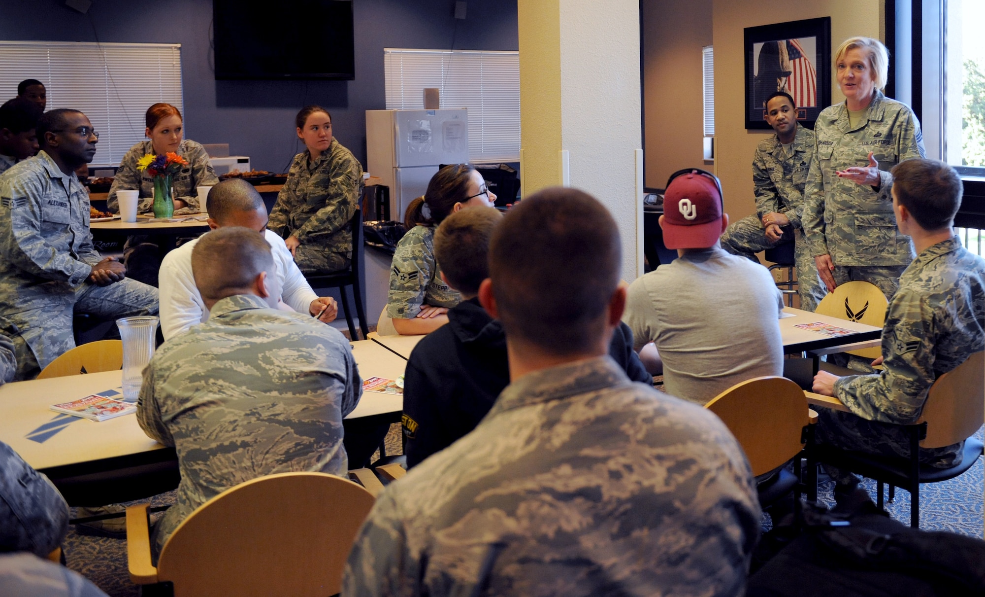 Chief Master Sgt. Tracy Bozarth-Larouche, Air Force Global Strike Command, speaks to Airmen during a dorm council meeting on Barksdale Air Force Base, La., Jan. 17. The meetings are an open forum where Airmen and dorm management talk about issues concerning the base dorms. Meetings are held on the third Thursday of every month and issues such as safety, health concerns and morale are discussed. (U.S. Air Force photo/Airman 1st Class Benjamin Gonsier)

