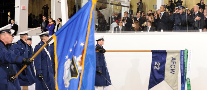 President Barack Obama, Air Force Chief of Staff Gen. Mark Welsh III and Vice President Joe Biden (top right) recognize Cadet Squadron 22 as it marches during the 57th inaugural parade Jan. 21, 2013. The armed forces have participated in inaugurations since George Washington was sworn in April 30, 1789. (U.S. Air Force photo/Elizabeth Andrews)