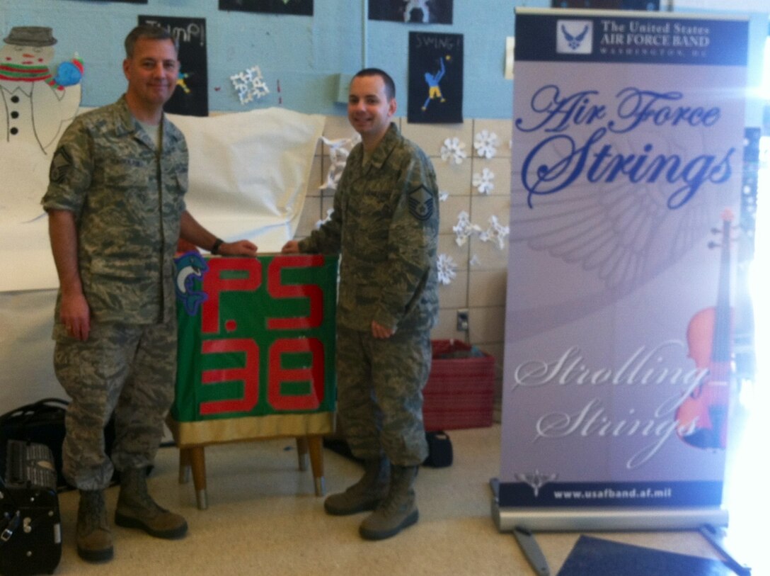 SMSgt Tortolano and MSgt Busso at P.S. 38, Staten Island, NY (U.S. Air Force photo by TSgt Ni Santiago)
