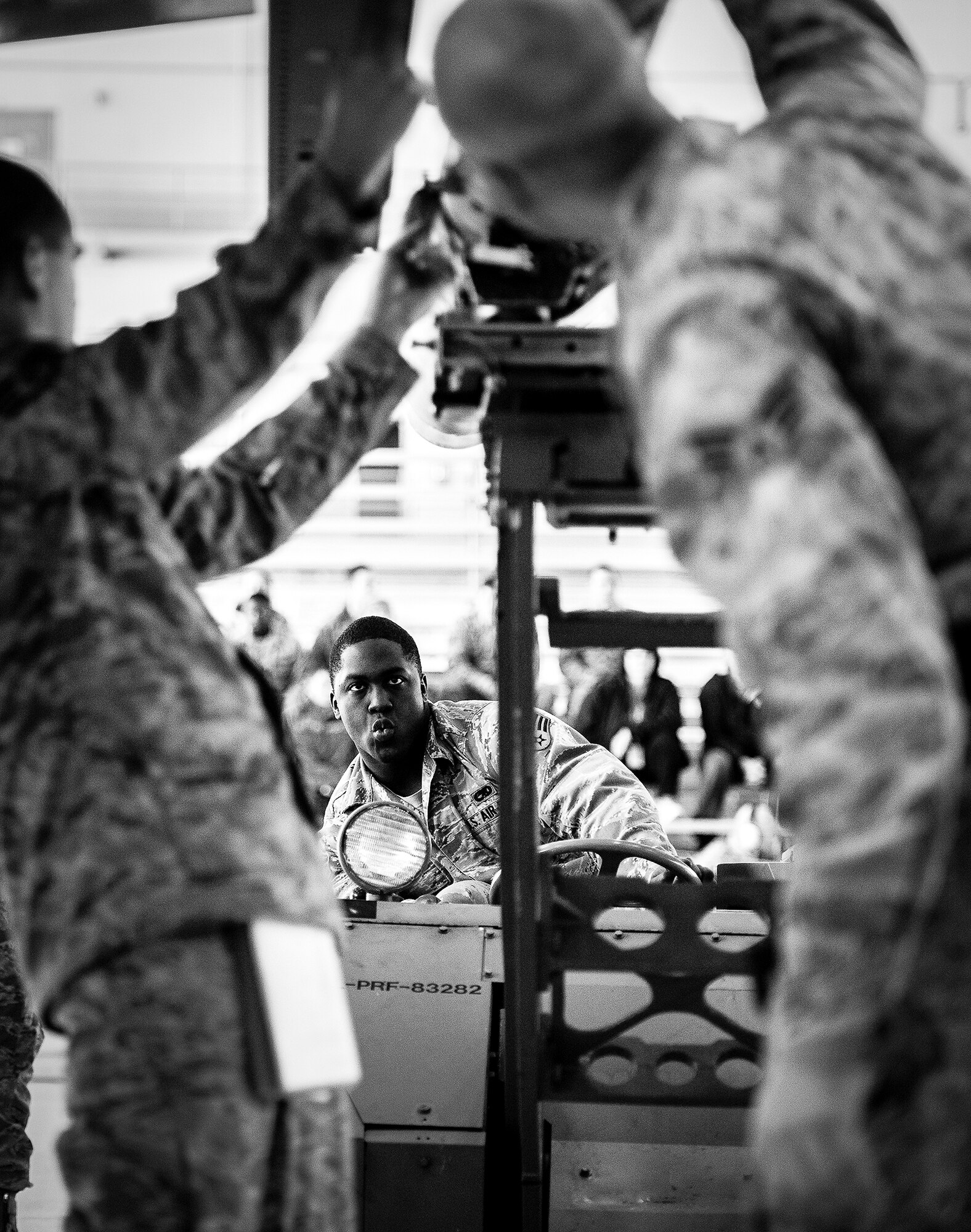 Senior Airman Kevin Hawkins, of the 96th Aircraft Maintenance Squadron Blue, drives the AIM-120 in to place with the lift truck during the 2012 Loadcrew of the Year competition Jan. 18 at Eglin Air Force Base, Fla.  The best of the best maintainers from AMU Red and Blue battled for the title of this yearly competition.  The Blue Team was timed and judged for accuracy of their weapons load of an F-16, while the Red Team was evaluated on an F-15. Although the Blue Team finished first, the competition is still being judged.  The winners will be announced at the 46th Maintenance Group annual awards banquet in March.  (U.S. Air Force photo/Samuel King Jr.)