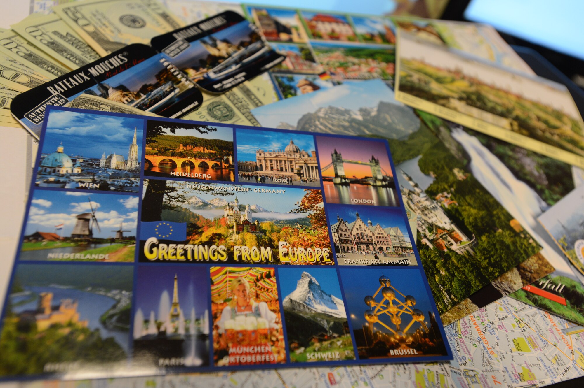 Postcards and travel receipts display a variety of traveling opportunities throughout Europe. (U.S. Air Force photo/Senior Airman Caitlin O’Neil-McKeown) 
