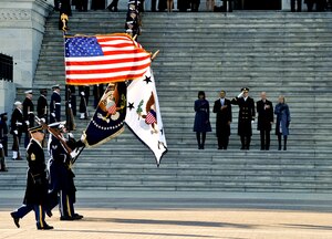 Members of the Joint Armed Forces Color Guard perform pass in review for the President of the United States in Washington, Jan. 21, 2013. Military involvement in the presidential inauguration dates back to April 30, 1789, when members of the U.S. Army, local militia units and revolutionary war veterans escorted George Washington to his first inauguration ceremony. (DOD photo by U.S. Air Force Staff Sgt. Wesley Farnsworth/Released)