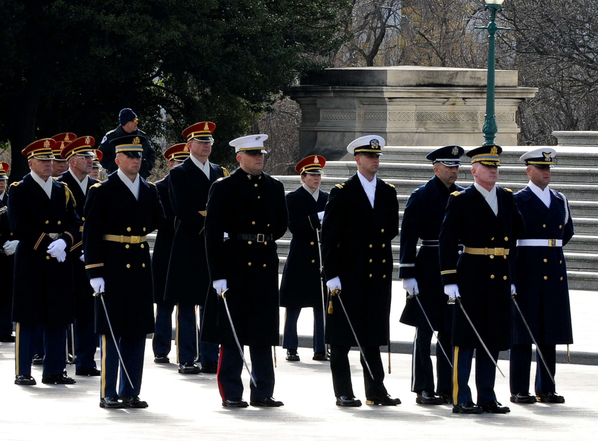 Military officers stand at ease while waiting to perform their pass and review for the president during the 57th Presidential Inauguration in Washington, Jan. 21, 2013. Military involvement in the presidential inauguration dates back to April 30, 1789, when members of the U.S. Army, local militia units and revolutionary war veterans escorted George Washington to his first inauguration ceremony. (DOD photo by U.S. Air Force Staff Sgt. Wesley Farnsworth/Released)