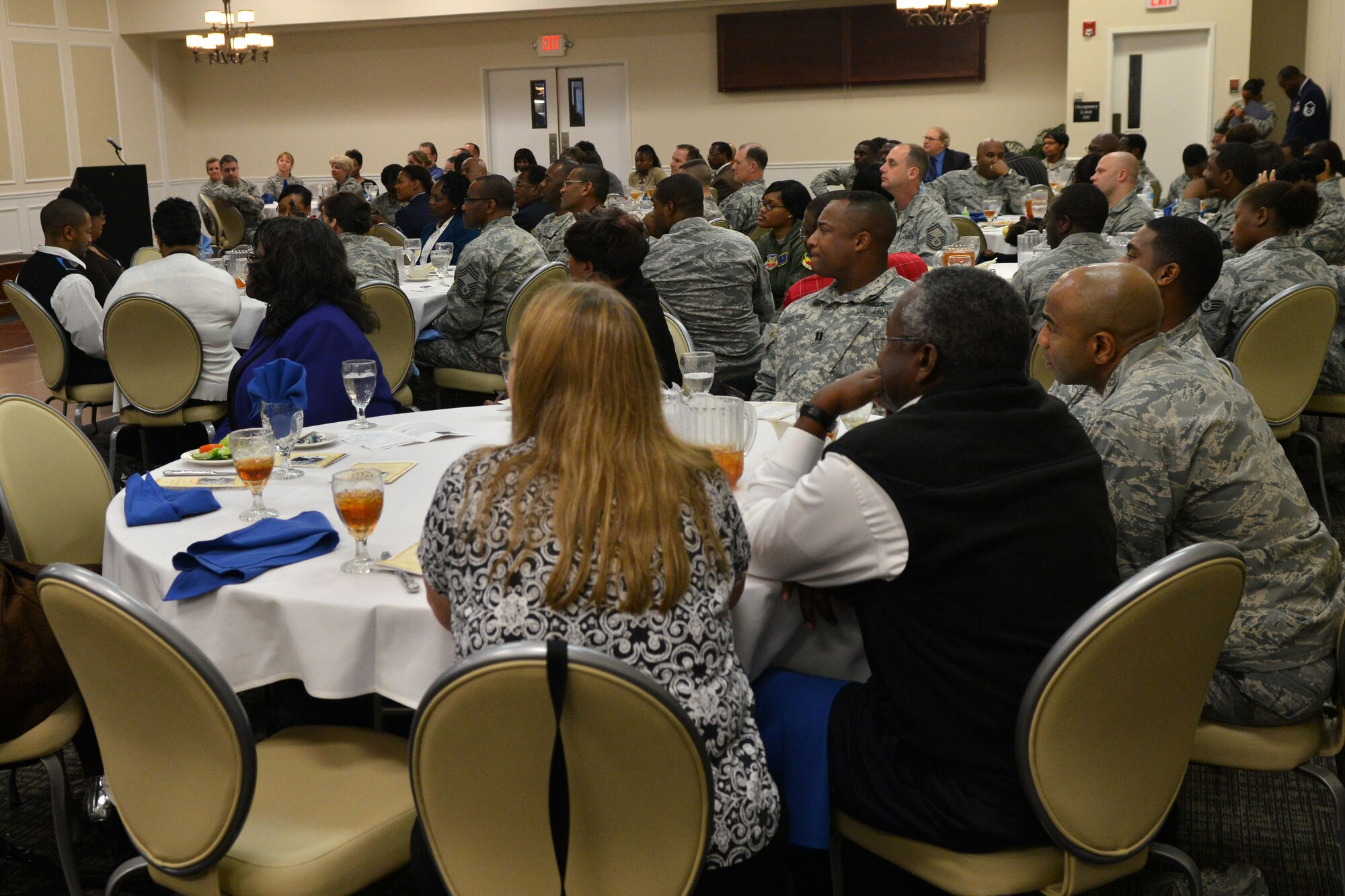 Team Shaw members gather for the Martin Luther King Luncheon, Shaw Air Force Base, S.C. Jan.15, 2013. The guest speaker for the event was Norman Curlee the Kingdome Builders Christian Center pastor. (U.S. Air Force photo by Airman 1st Class Ashley L. Gardner/Released)