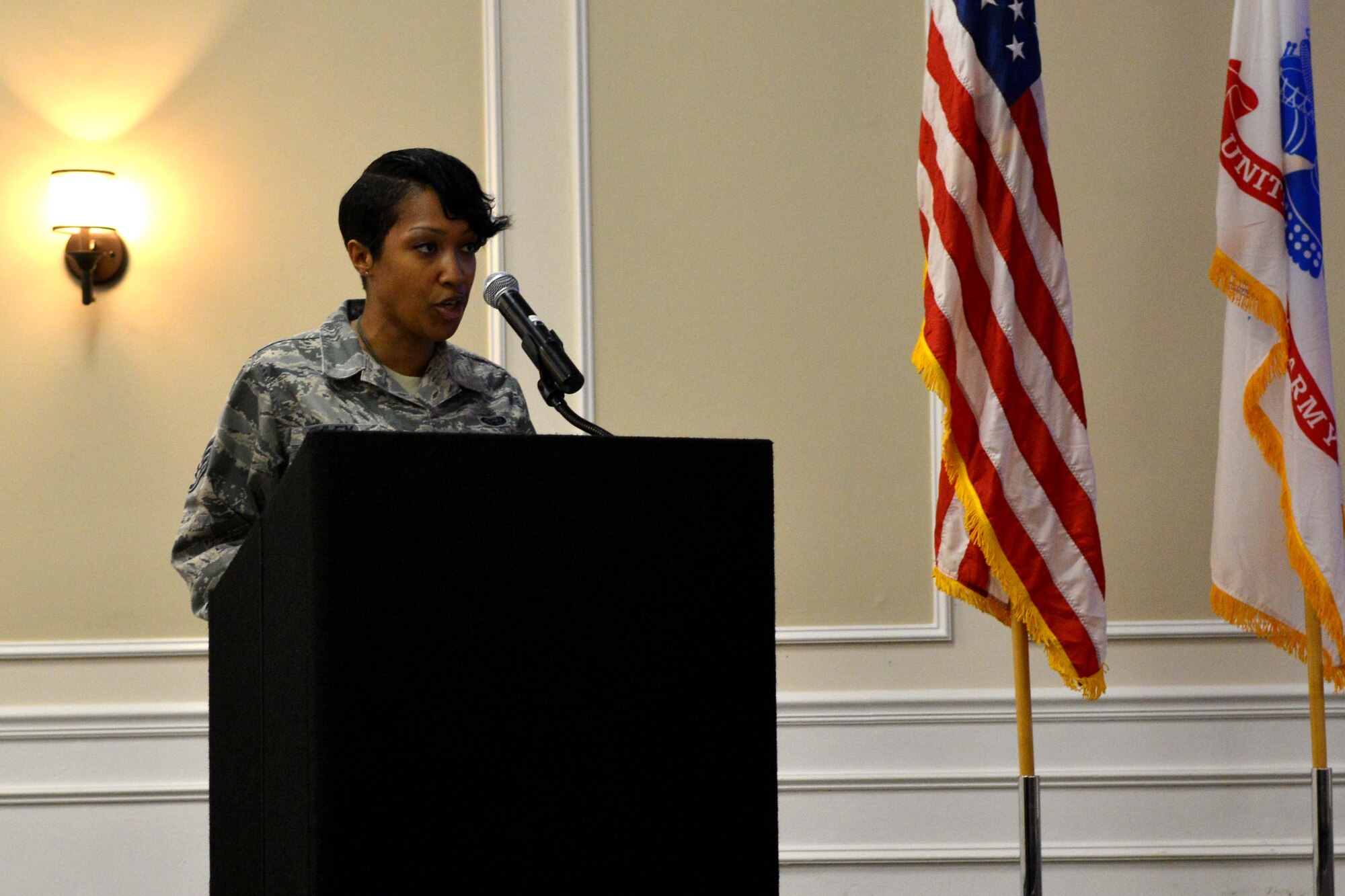 U.S. Air Force Staff Sgt. Marquita Finley, Air Forces Central Command client support technician, recites her poetry for the Martin Luther King Luncheon, Shaw Air Force Base, S.C. Jan.15, 2013. The guest speaker for the event was Norman Curlee the Kingdome Builders Christian Center pastor.  (U.S. Air Force photo by Airman 1st Class Ashley L. Gardner/Released)