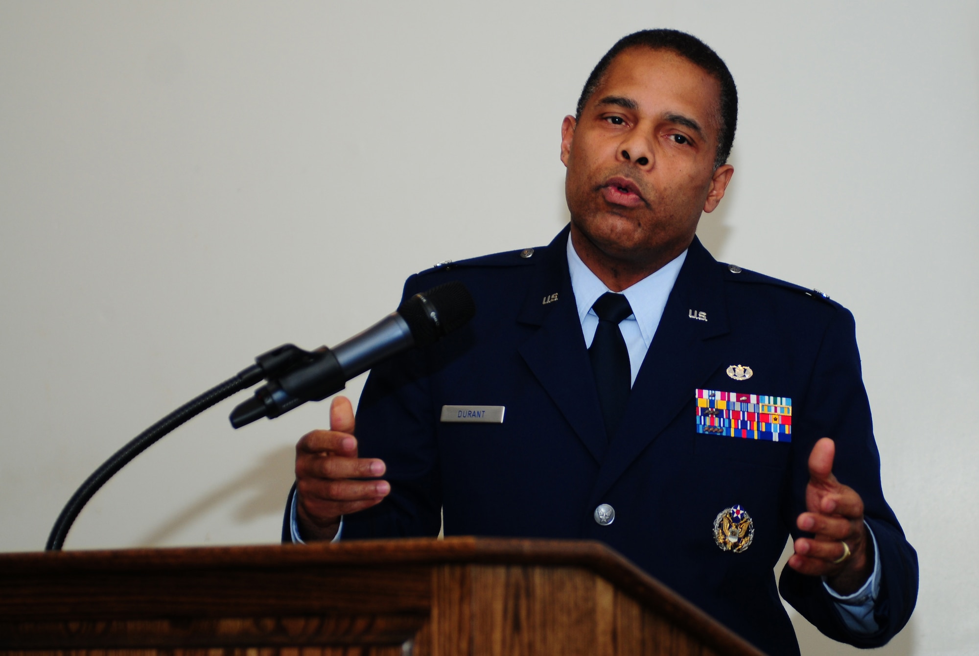 ROYAL AIR FORCE LAKENHEATH, England -- Col. James M. Durant III, director of legal services for United States Air Forces in Europe, speaks as the guest speaker at the Dr. Martin Luther King, Jr. Observance Luncheon Jan. 18, 2013. King was the chief spokesman for nonviolent activism in the civil rights movement, which successfully protested racial discrimination in federal and state law. (U.S. Air Force photo by Airman 1st Class Dana Butler)

