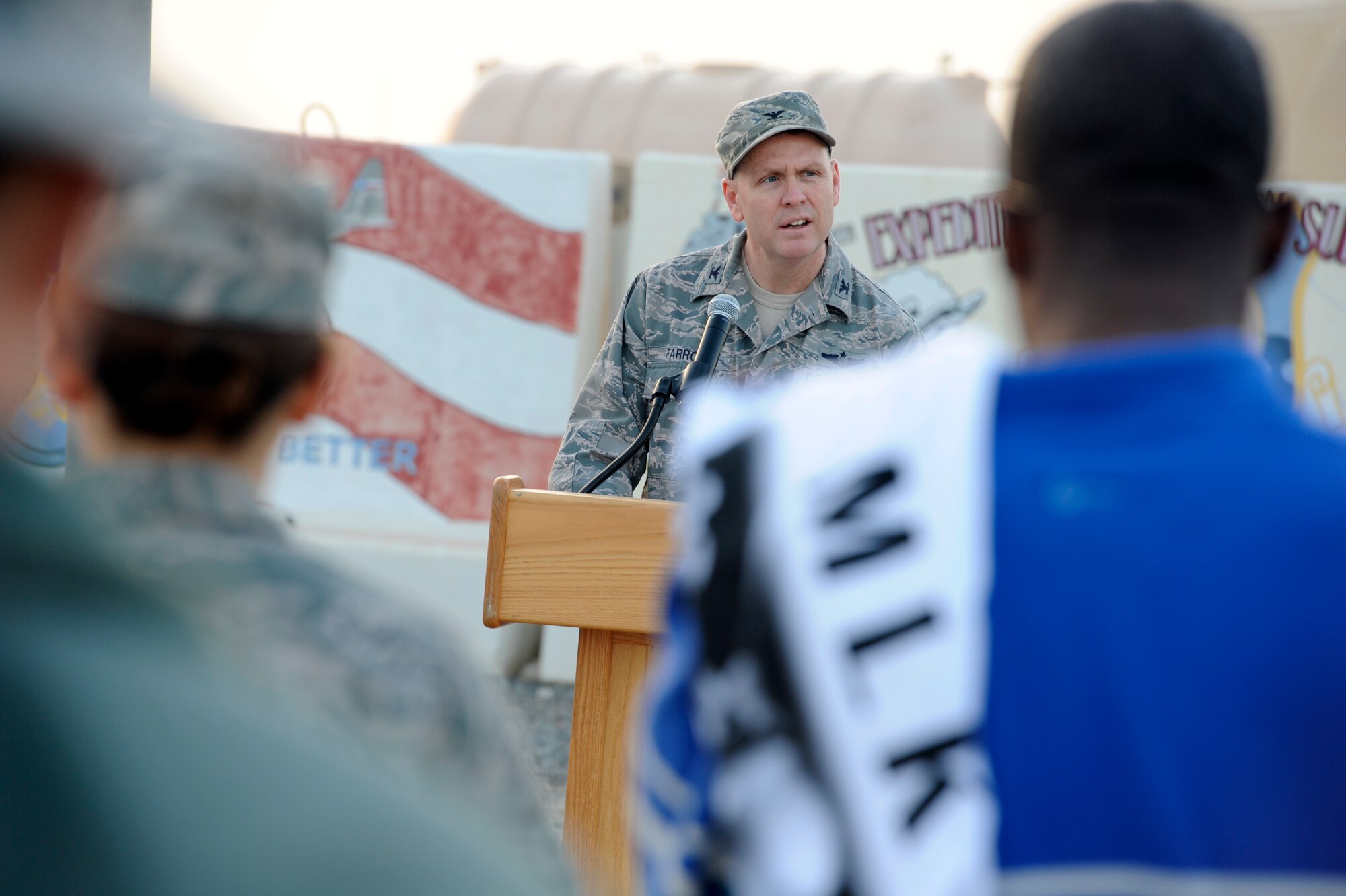 Col. David Farrow, 386th Air Expeditionary Wing commander delivers the opening remarks as service members commemorate the legacy and achievements of Dr. Martin Luther King Jr. at the 386th Air Expeditionary Wing. (U.S. Air Force photo by Staff Sgt. Austin Knox)