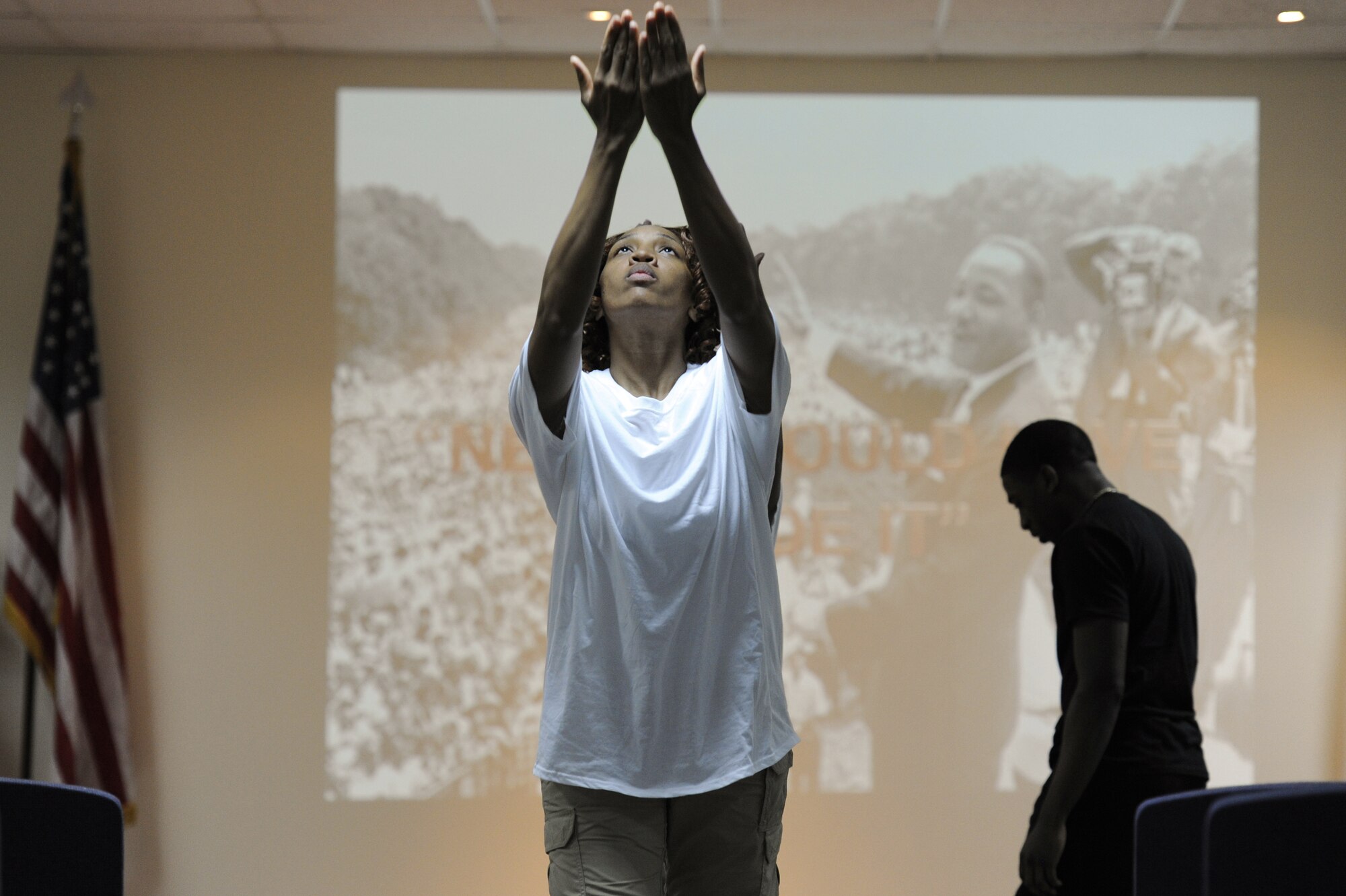 Staff Sgt. Whitney Boyd, a praise team dancer assigned to the 386th Expeditionary Logistics Readiness Squadron performs during the MLK Day Birthday Service of Celebration at the 386th Air Expeditionary Wing base chapel.  (U.S. Air Force photo by Staff Sgt. Austin Knox)