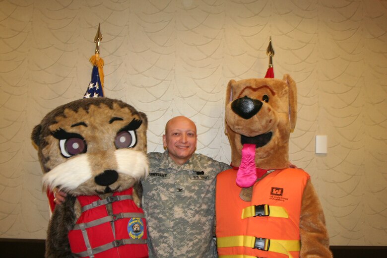 Northwestern Division Commander, Colonel Anthony C. Funkhouser welcomes Josh the Otter into the Corps' family as a partner to help promote water safety and water safe behavior for children by instructing them to avoid water unless accompanied by an adult.